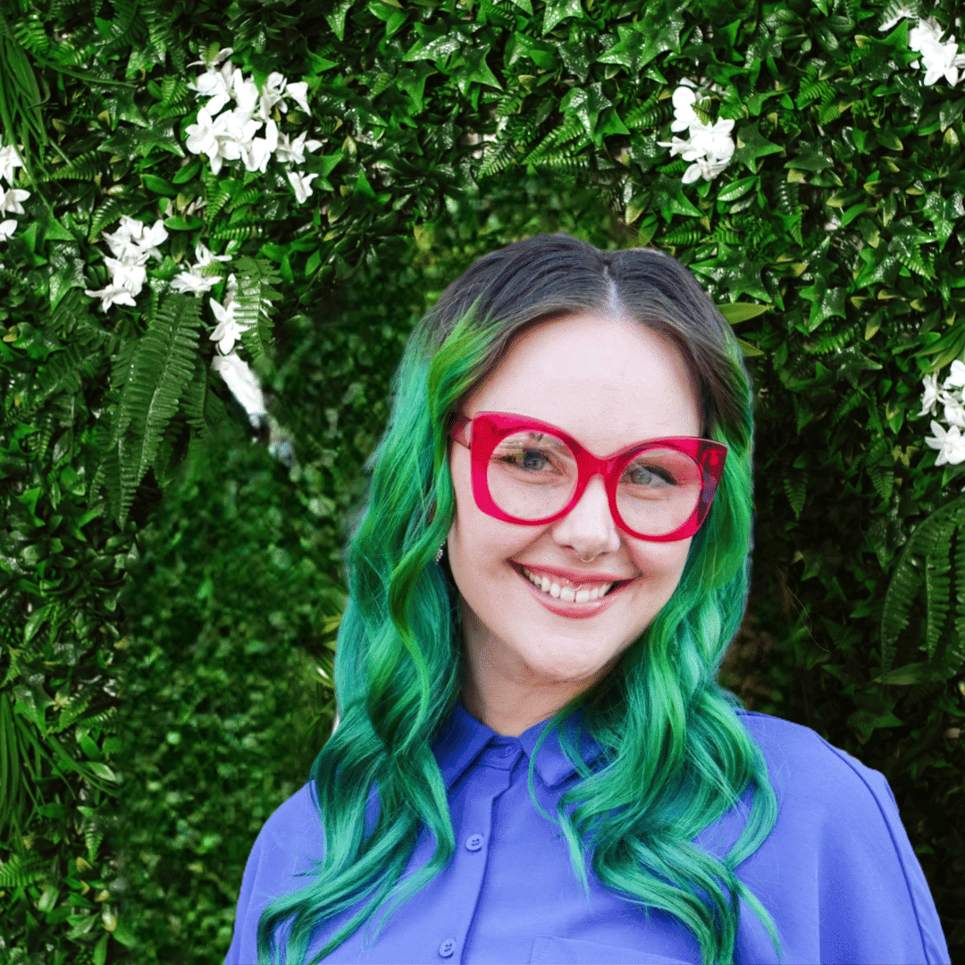 Portrait of Sami, a professional stylist at Utopia Salon, showcasing their expertise and style.