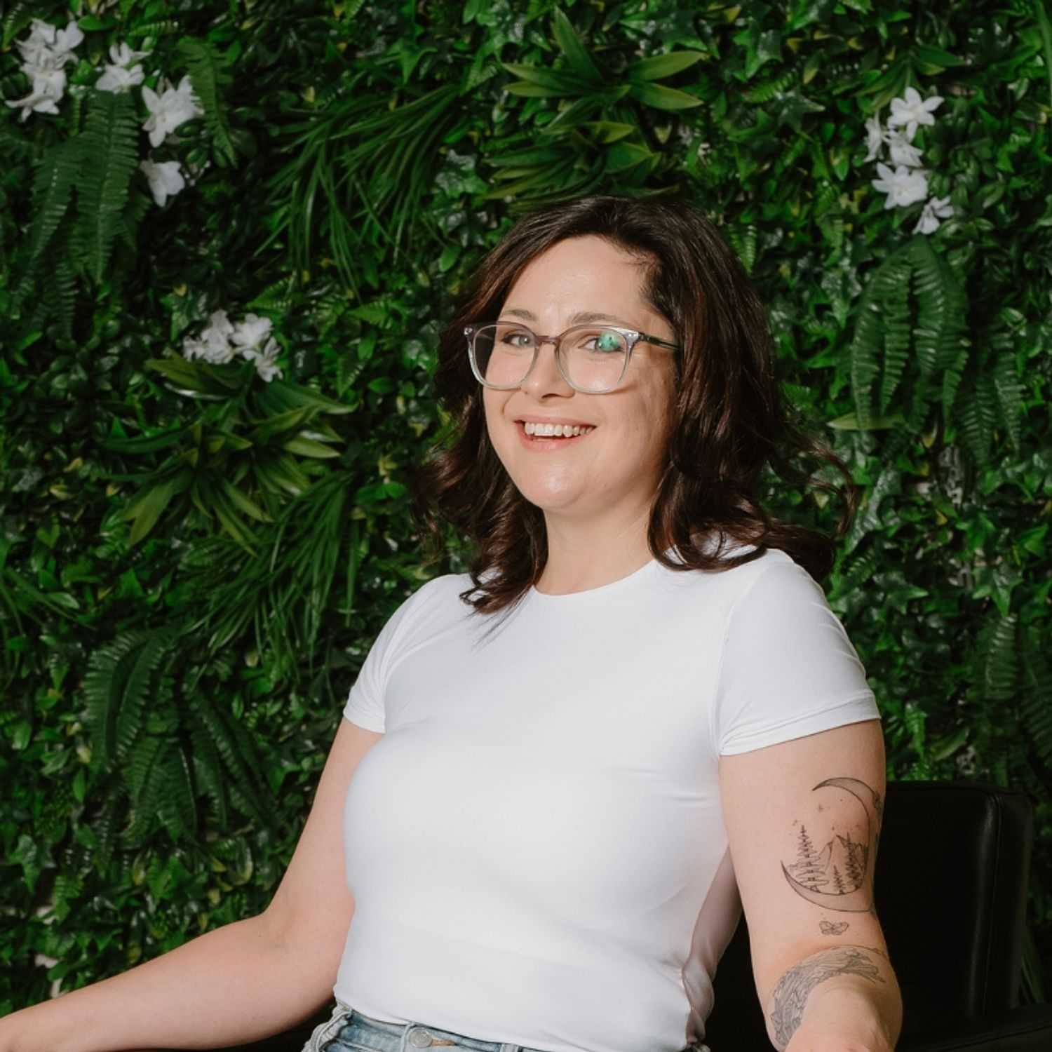 Portrait of Jess, a professional stylist at Utopia Salon, showcasing their expertise and style.