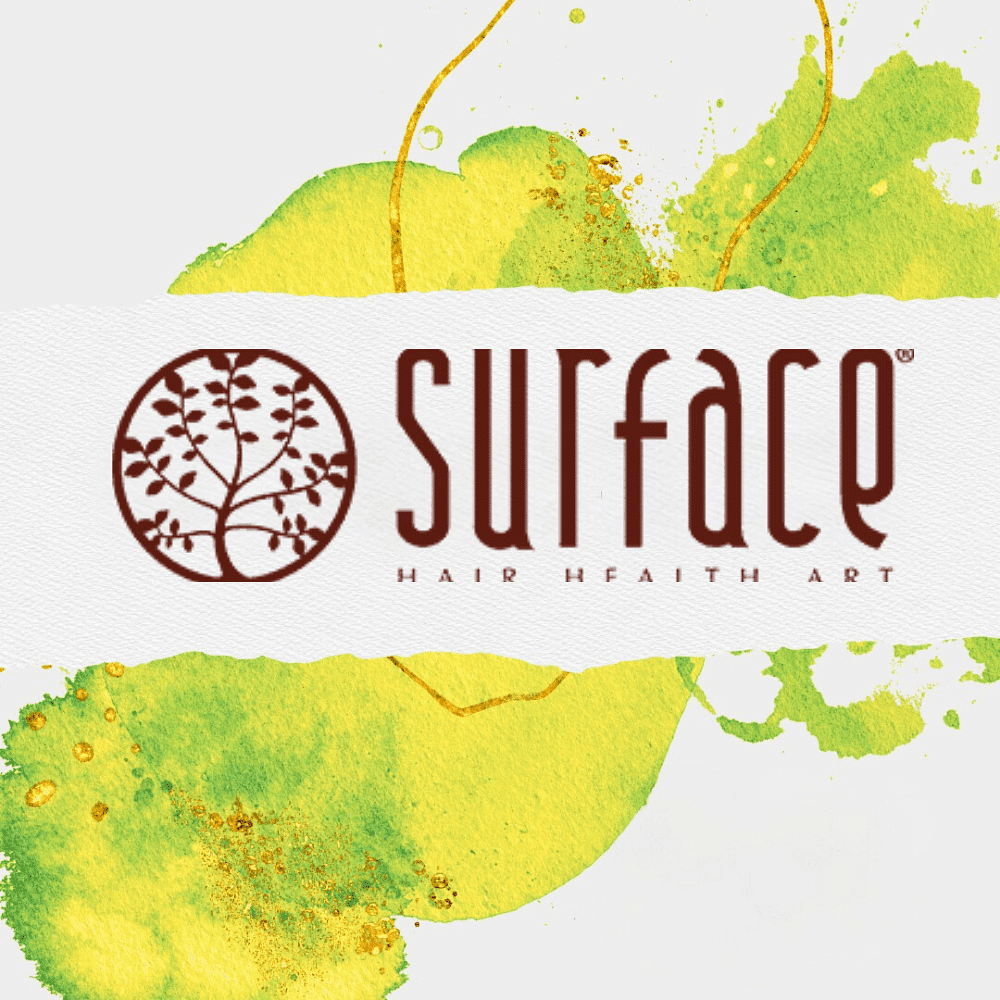 Surface Hair Health Art logo with green and yellow abstract background.