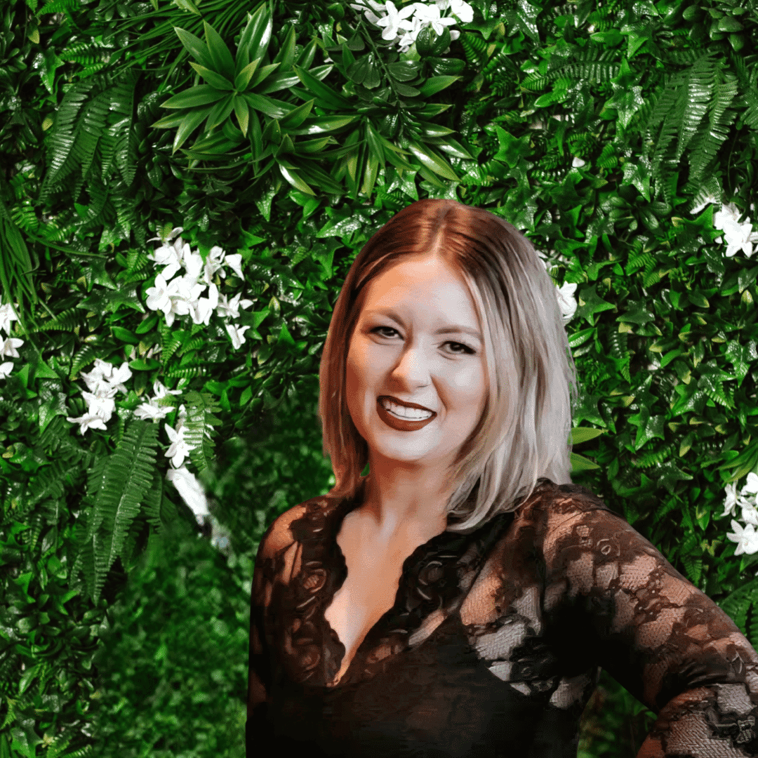 Portrait of Courtney, a professional stylist at Utopia Salon, showcasing their expertise and style.